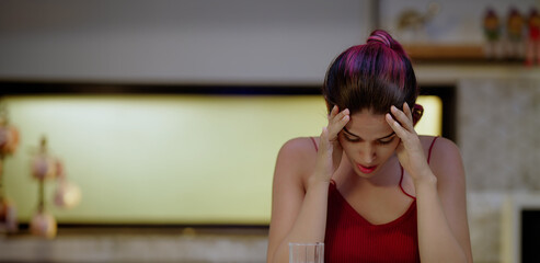 Indian Asian Hindu tired sad stress lonely gen z woman lady in modern kitchen indoor home upset lone tense young adult female girl think fail feel bad guilty lost job facing health issue inside house	