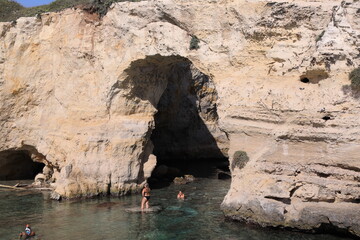 cave in the cave, faraglioni sant'andrea, salento, italy