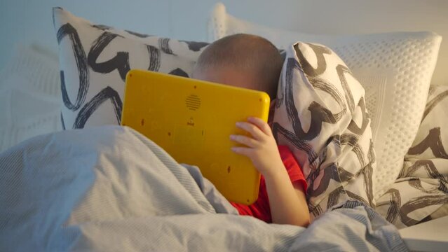 child learning alphabet on smarty alphabet tablet to learn letters, ABC, numbers, shapes, colors, music and words. Interactive toddler learning and education toys for kids boys and girls