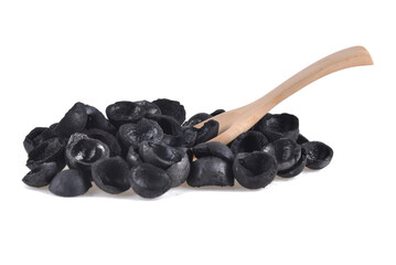 charcoal macadamia isolated on white background
