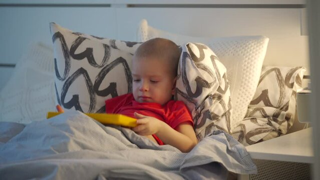 child learning alphabet on smarty alphabet tablet to learn letters, ABC, numbers, shapes, colors, music and words. Interactive toddler learning and education toys for kids boys and girls