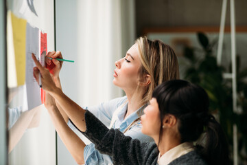 Women working on documents