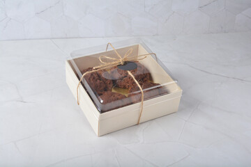 gourmet freshly bake golden Texas sweet chocolate chip honey biscuit cake scone milk butter bread in square bento wood box on white marble table rose gold fork knife pastry halal dessert vegan menu