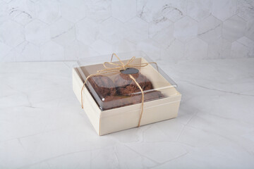 gourmet freshly bake golden Texas sweet chocolate chip honey biscuit cake scone milk butter bread in square bento wood box on white marble table rose gold fork knife pastry halal dessert vegan menu