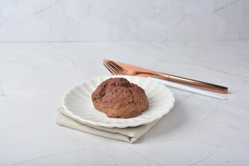 gourmet freshly bake golden Texas sweet chocolate chip honey biscuit cake scone milk butter bread in square bento wood box on white marble table rose gold fork knife pastry halal dessert vegan menu