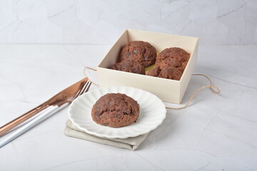gourmet freshly bake golden Texas sweet chocolate chip honey biscuit cake scone milk butter bread in square bento wood box on white marble table rose gold fork knife pastry halal dessert vegan menu