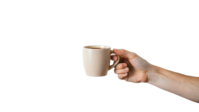 Hand holding a steaming cup of coffee