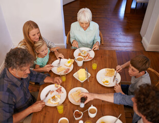 Family, children and eating food from above for healthy nutrition meal, wellness or bonding. Women,...