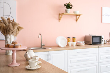 Obraz na płótnie Canvas modern kitchen interior with kitchen utensils