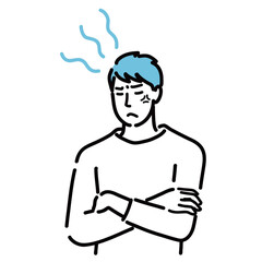 腕を組んでイライラしている若い男性
