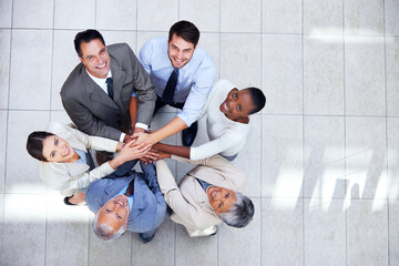 Business people, portrait and huddle for hands in stack, community and support or unity....
