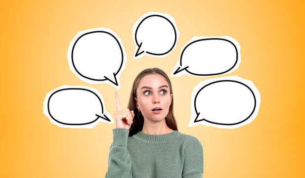 Inspired woman with finger point up, mockup copy space empty speech bubbles