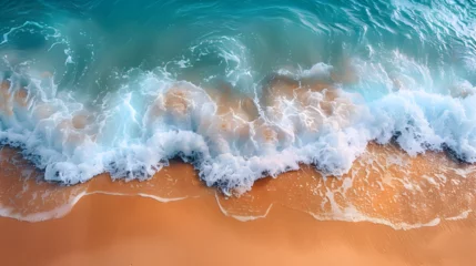 Tuinposter Sea waves and sandy beach background © Atipong