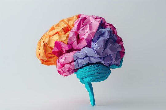 Image of a brain made of paper on an isolated background. Beautiful concept of creativity, right brain ideas. The background image represents the creativity of using the brain and creating media.
