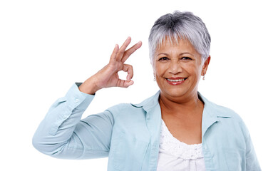 Portrait, senior woman and ok sign with agreement, smile and model isolated on white studio...
