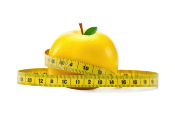 Yellow Apple With Measuring Tape. on a White or Clear Surface PNG Transparent Background.