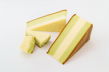 Matcha sandwich cake on white background