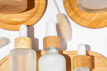 close up of cosmetics eco package. refillable bottles on white background