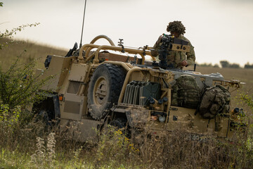 close-up of a British army Supacat Jackal 4x4 rapid assault, fire support and reconnaissance...