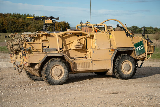 close-up of a British army Supacat Jackal 4x4 rapid assault, fire support and reconnaissance vehicle, in action on a military exercise, Wilts UK