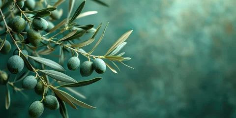 Poster A close-up of an olive branch laden with green olives, set against a soft, bokeh background in hues of teal. © Александр Марченко