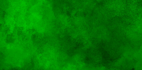 Freeze motion of green dust explosion on black background.Green smoke stage studio. Abstract fog texture overlays,Explosive powder green on black background.