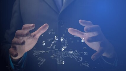 Cg footage about world domination. In the hands of a businessman, illuminated from within, symbols of digitalization of daily lives and signs of world currencies are moving above the map of the world