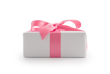White gift box with pink ribbon bow isolated on white background
