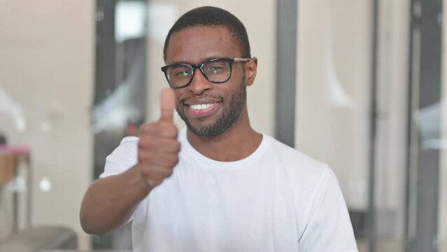 Portrait of Casual African Man with Thumbs up