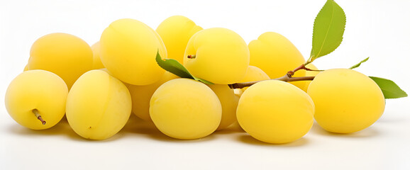 Pile of multiple yellow mirabelle plums isolated over the white background
