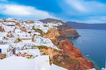 View of Oia town on Santorini island in Greece. Travel mediterranean aegean of traditional cycladic...