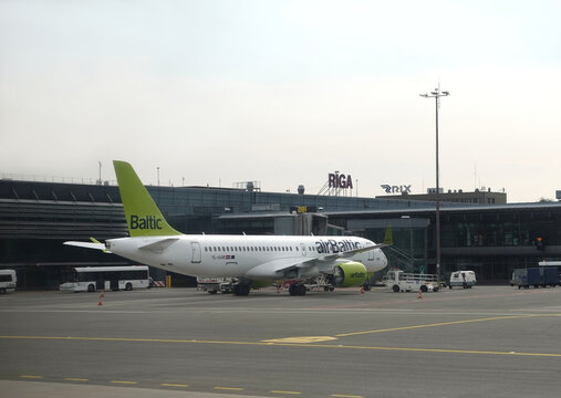 RIGA, LATVIA - September the 14th, 2019: Passenger supersonic plane Boeing Air Baltic Airlines after landing in Riga international airport