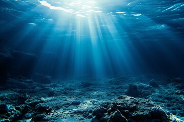 Underwater view of the coral reef with sunbeams and rays