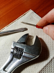 The master prepares the tools for work, close-up