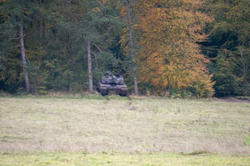 British army Challenger 2 II FV4034 main battle tank in action on a military exercise, hidden in...