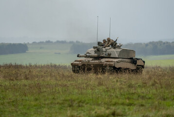 British army Challenger 2 II FV4034 main battle tank in action on a military exercise, taking aim