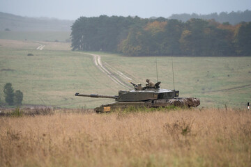 soldier commanding a British army Challenger 2 II FV4034 main battle tank in action on a military...