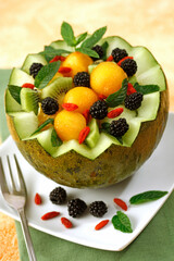 Stuffed melon with fruit.