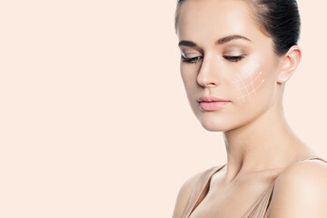 Fototapeta premium Lovely fashion model face close up. Medicine, facial treatment, massage and plastic surgery concept