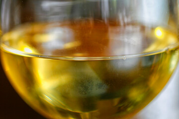 Close up of white wine in glass - 759653239
