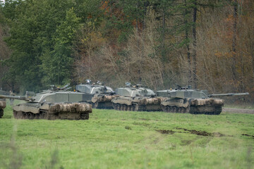 a squadron of British army FV4034 Challenger 2 ii main battle tanks preparing for a military...