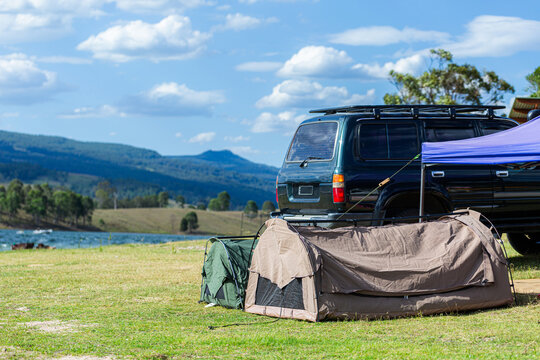 Swags and gazebo at lakeside campground on Australia Day