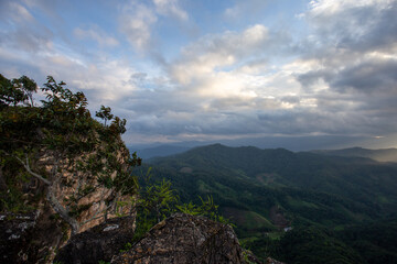 mountain landscape on a high cliff in Thailand See fertile mountains and many clouds in the sky. The cool wind blows and refreshes the heart.