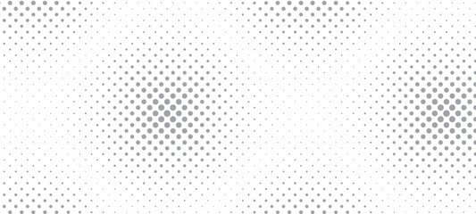 Grey dotted halftone pattern banner background.