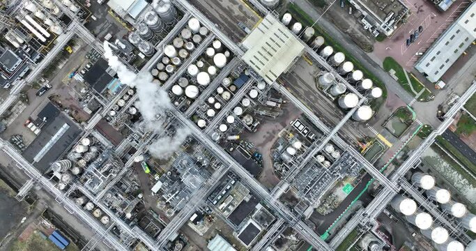 Chemical park aerial top down view. Industrial installation, production of chemicals and plastics, polymers. Aerial drone view.
