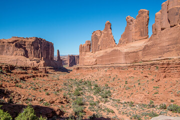 Sunny day in Arches National Park near Moab in Utah. The park contains more than 2000 natural sandstone arches.