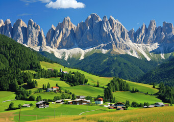 a view of the Dolomites in South Italy, with green meadows and small villages below, with tall white mountains behind them