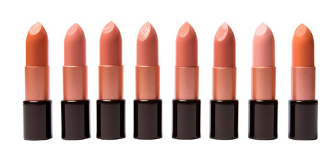 Obraz premium Multiple different tone peach fuzz color lipstick in a black case in a row on a white background. Make up a product photo shoot. Copy space, PNG, transparent background.