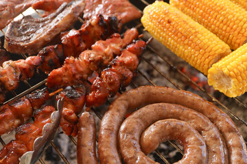 South African braai including Boerewors, chicken kebabs, chops and mielies or corn on the cob