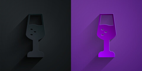 Paper cut Glass of champagne icon isolated on black on purple background. Happy Valentines day. Paper art style. Vector